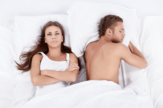 woman in bed with a weak man